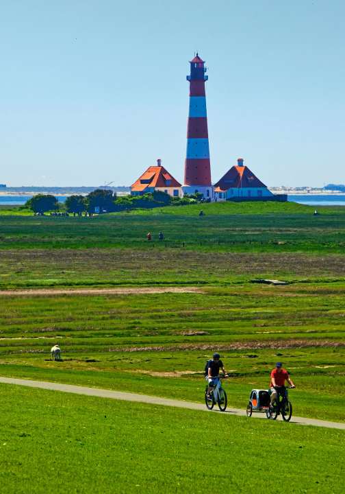 The Westerhever lighthouse can be seen from afar on the German North Sea Coast long-distance cycle route.