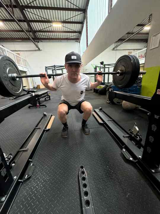 Squat with the barbell: This gives enduro pros the leg strength they need to remain stable on their mountain bikes.