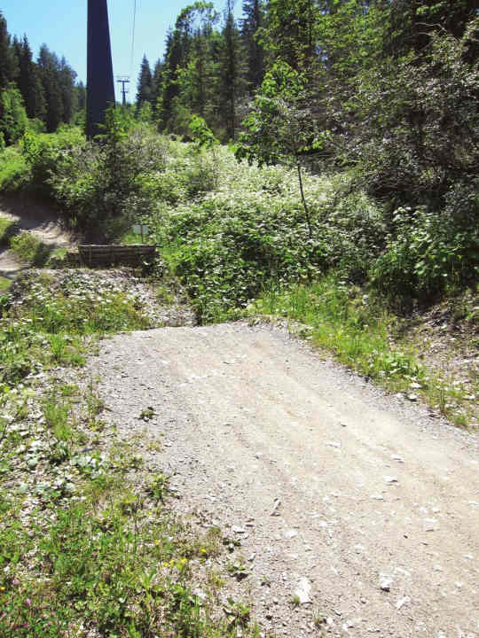   Forgives mistakes and encourages jumping: Gap jump with a wide landing and plenty of run-out (Schladming).