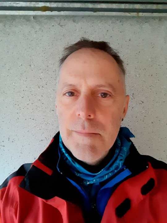 Paul Thomas, mountain biker from South Baden, rides with a mini cowbell on his bike.