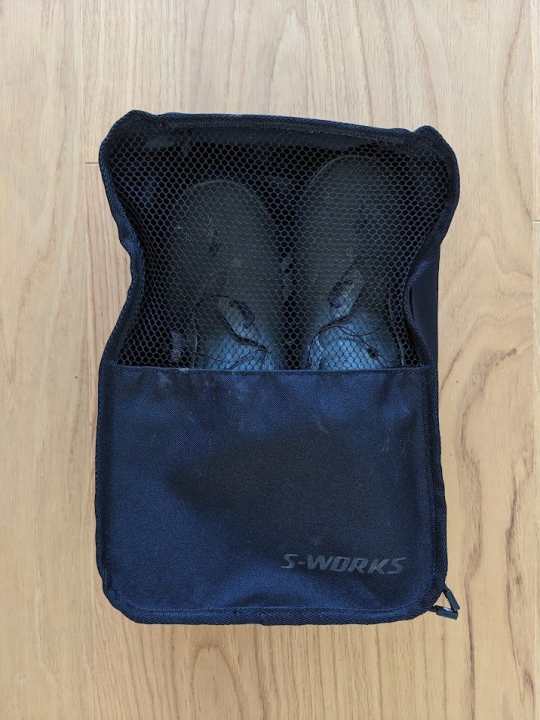 A practical transport bag is included.