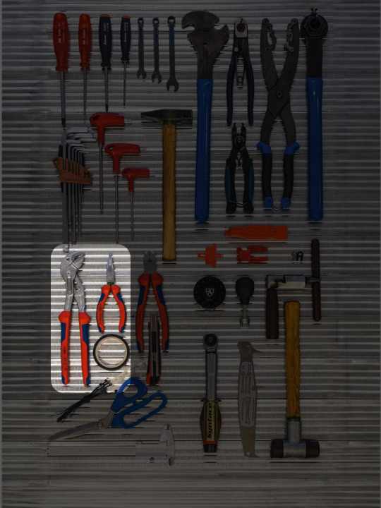 Pipe wrench or water pump pliers and flat nose pliers