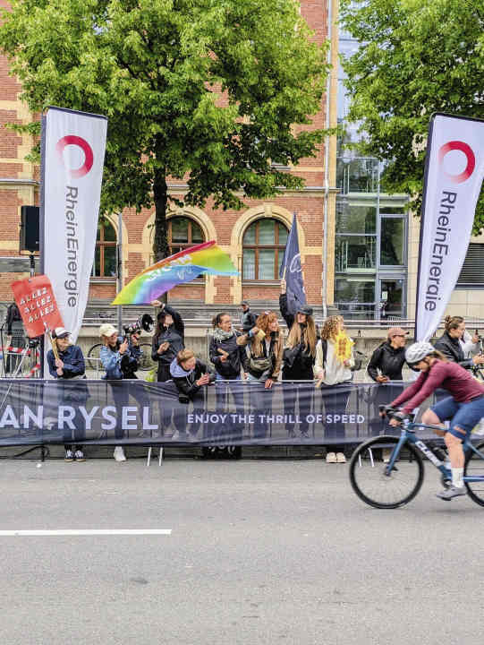 Motivational boost: The cyclists cheer loudly for all the men and women at the start.