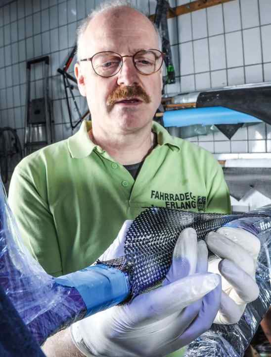 Eberhard Schirmer doesn't need many machines for carbon repairs, but he does need a lot of experience and a great deal of dexterity.