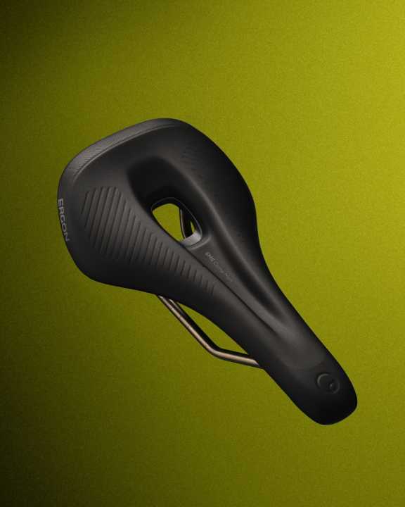 An enlarged recess is designed to provide effective relief for more upright sitting positions