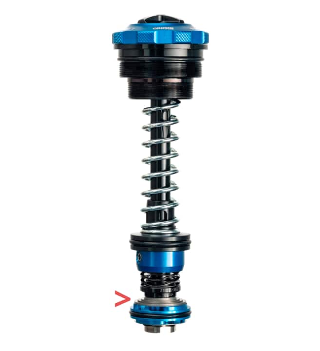 Grip X2: Das turmförmige Shim-Paket (roter Pfeil) besteht aus 23 einzelnen Shims