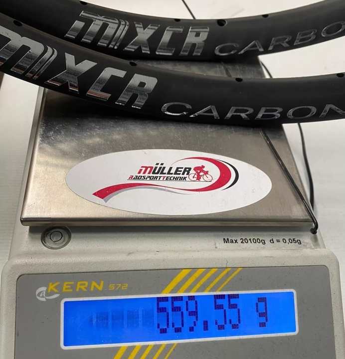 559.55 grams for two Müller MXCR rims! The one spoke has certainly already been factored out.