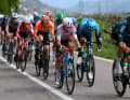 A large breakaway group breaks away from the peloton