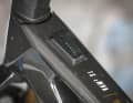 The LED display in the top tube uses diode light to provide information on the riding mode and battery status. A USB port is also hidden in the display.