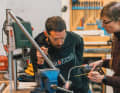 Frame building professionals and customers together: In frame building courses, bikers can solder their own dream frame themselves.