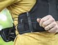 Fine-tuning is done via a lacing system. It’s easy to operate with one hand. The fit on the trail is brilliant.