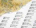 The map legend contains all the important information about the pass roads, including whether they are smooth tarmac or gravel roads.