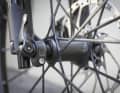 The carbon spokes are inseparably connected to the hub and rim.