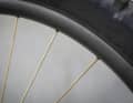 Instead of steel or carbon, Pirope uses a fibre spoke made of tensile Vectran.