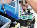 Finally, an employee assembles the larger, pre-assembled parts and installs the central electronics.
