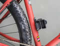 The practical case can be folded down to the side for opening and mounted on the frame, bottle cage holes or a Topeak Ninja bottle cage as required
