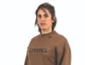 Prominent model: downhill racer Myriam Nicole in a crewneck jumper from her sponsor Commencal.