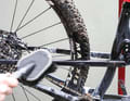 Once the cleaner has worked in, remove the remaining dirt with a large brush with long, soft bristles