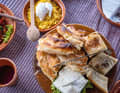 Pastrmajlija, a kind of Macedonian pizza, is a must at every dinner.