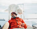 Do I smell seasickness? The dog Ceppa thinks the three trail seekers are landlubbers.