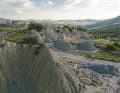 Weathering has shaped the bizarre rocky peaks and gorges of the Calanchi. Film set for "The Passion of the Christ", among others.