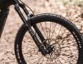 Even with a huge 220 mm disc, Shimano's cheapest four-piston MT-420 brake has a little less bite.