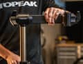 Height adjustment via a quick-release lever.  Working height: 101.5 to 160 cm.