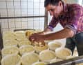 Mountain farmer André Barth from Ferme Soultzersmatt processes the milk from his 20 Vosges cows into Munster cheese.