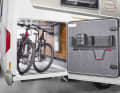 The advantage of fully or semi-integrated motorhomes is the rear garage for storing bicycles.