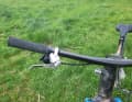 ...even if the cable runs into the handlebars or the headset.