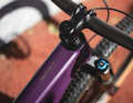 The LT version comes with a thicker fork (e.g. Fox 34 SC) with 120 millimetres.