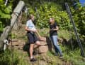 Winemaker Verena Waigand explains her work in the vineyard to MYBIKE author Christiane Bertelsmann