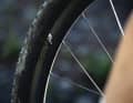 An asymmetrical rim design is intended to better balance the spoke tension on the drive and non-drive sides. The result: greater durability and improved directional stability.