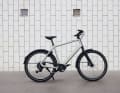 The Curb T9 uses a chain and a derailleur with nine gears.