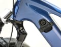 The battery folds out to the side and offers a whopping 840 watt-hours. However, it is still unlocked using a key, rather than via a touchscreen display as with the more expensive models.