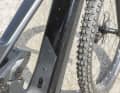 Either an additional battery or a bottle cage can be attached to the eyelets on the down tube.
