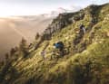 On the third stage, the trail descent from the Saccarello summit down to Realdo already glows in the magical evening light.