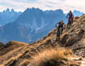 Irene and Picco enjoy the autumn atmosphere
 on the Carnic High Trail, which winds endlessly along the
 along the ridges at 2000 metres.