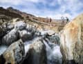 The swaying namesake of the tour: two Tibetan-style suspension bridges span the roaring meltwater of the Forni Glacier.