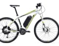 Giant Talon E+ 1: The Talon E+ 1 will cost €1999.90 in 2015. It comes with Shimano Deore 3x9 gears combined with Shimano Altus 355 brakes. The suspension fork is an SR Suntour XCR with 100 millimetres of travel. The Yamaha rear hub motor is powered by a slightly weaker 400 Wh battery pack.