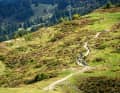 The Scalottas Trail is the most flowing trail away from the bike park. With ideal curve radii and small, natural jumps, it meanders along the slope to the Heidsee lake.