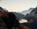 Mountains like shark's teeth: stop for a drink of water and a panoramic view. It's early in the day and the descent to the water reservoir at Passo Fedaia is imminent.