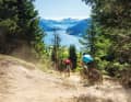 Plamort tour: descent with a view of the lake. The trail leads across the border to Reschen in Italy.