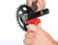 3 Unscrewing the chainring: Sram's direct mount chainrings are fixed to the crank at the rear with three bolts. The bolts can be easily loosened with a 25 mm Torx spanner. The chainring can then be easily removed.