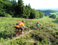 Synergy effects: The hang-gliding route near Werther also allows bikers a rare, unobstructed view of the Westphalian countryside.