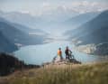 2. perhaps the most photographed spot in the border triangle: The legendary "viewing rock", from which you can enjoy an unobstructed view of Lake Reschen and the Ortler towering behind it.