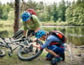 No, not a flat tyre. You rarely get punctures on the velvety-soft nature park trails. But a small branch can get caught in the rear derailleur.