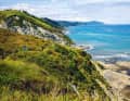 Trail surfing along the cliffs - and riding waves in the Atlantic after biking: where the evergreen Basque mountains push into the Bay of Biscay in the north of Spain, there is a network of trails that grows by a few kilometres every year.