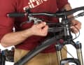 Pull the cable out of the brake lever. Hold the cable against the brake lever so that it runs close to the frame at full steering lock.