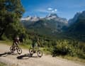 Rich in contrast: en route in the green Val Rendena. With a view of the grey-white Brenta Group.